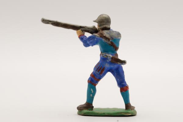 Landsknecht musketeer standing with French helmet